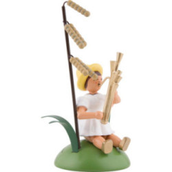 Blumenkind mit Haselblüte und Schalmei sitzend - 12 cm