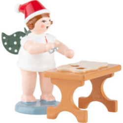 Bäckerengel mit Mütze und Ausstechform am Tisch - 6,5 cm