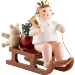 Engel sitzend mit Krone und auf Schlitten - 6,5 cm