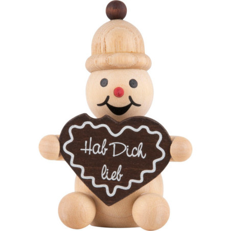 Schneemann Junior "mit Lebkuchenherz" sitzend - 7 cm